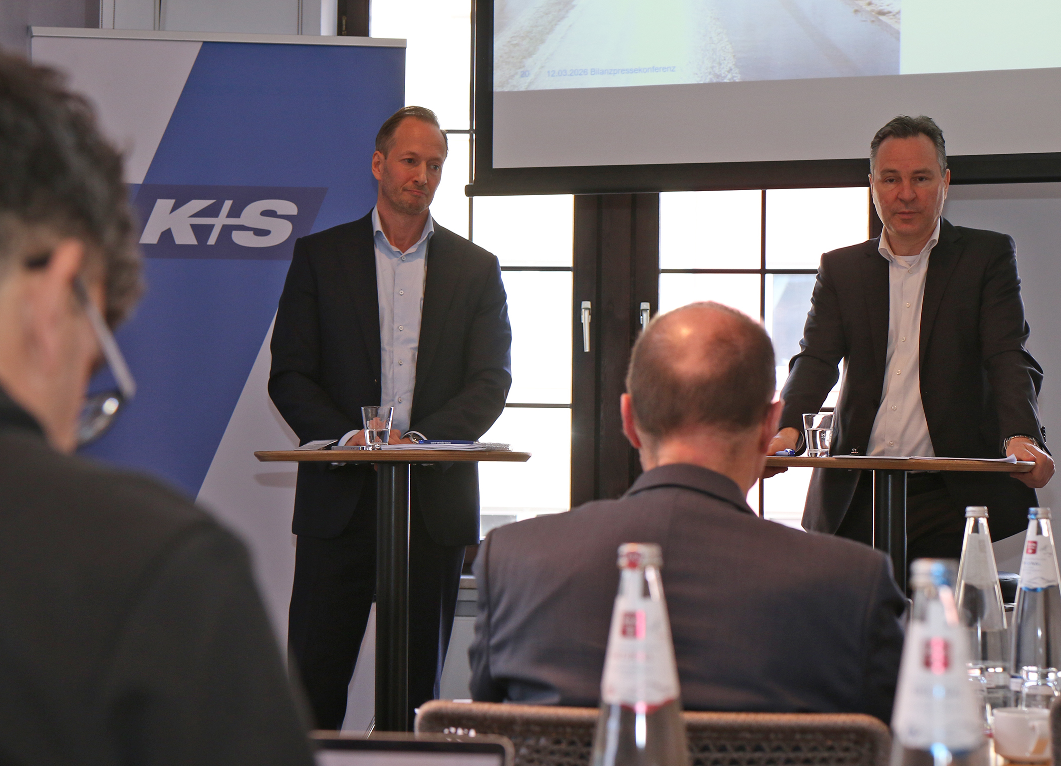 Dr. Jens Christian Keuthen and Dr. Christian H. Meyer are standing behind a podium at the K+S annual press conference 2026.