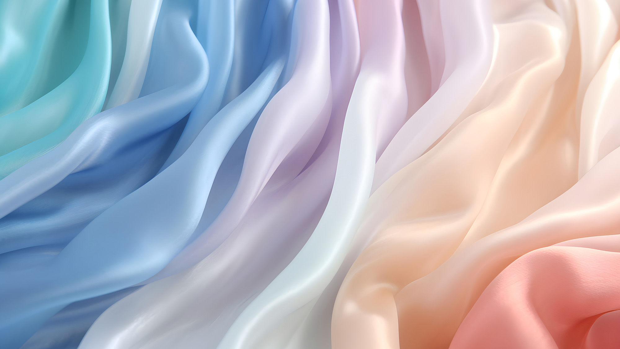 Abstrakte, weich fliessende Stofffalten in Pastelltoenen von Blau, Flieder, Creme und Pfirsich