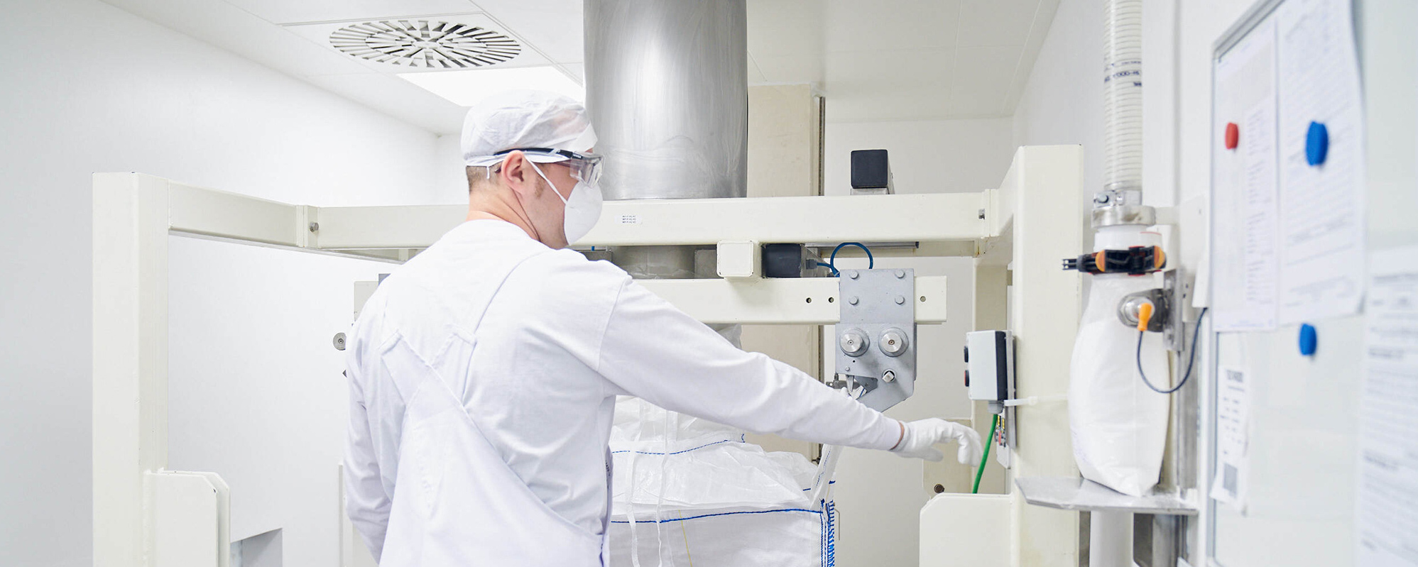 Man working at filling line for pharma salt